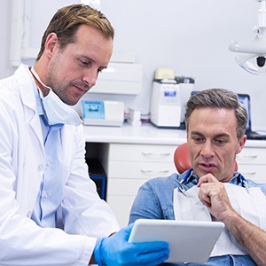 A patient consulting his dentist about dental care