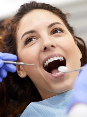Woman smiling during dental checkup